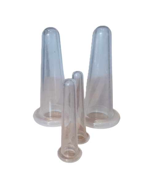 Set of clear plastic cones on a white background designed for facial cupping