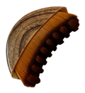 Wooden facial drainage brush with brown bristles on a white background