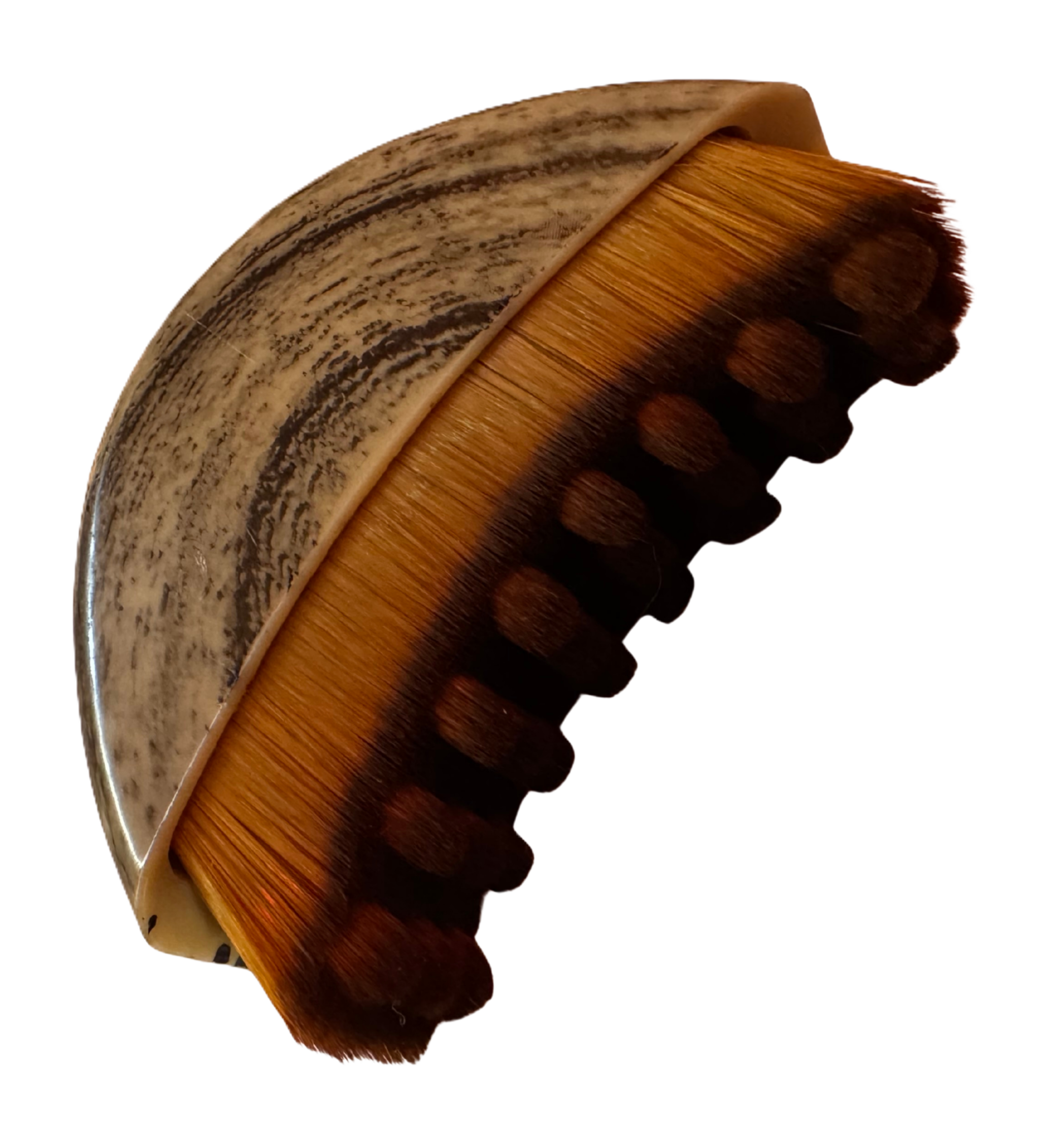 Wooden facial drainage brush with brown bristles on a white background