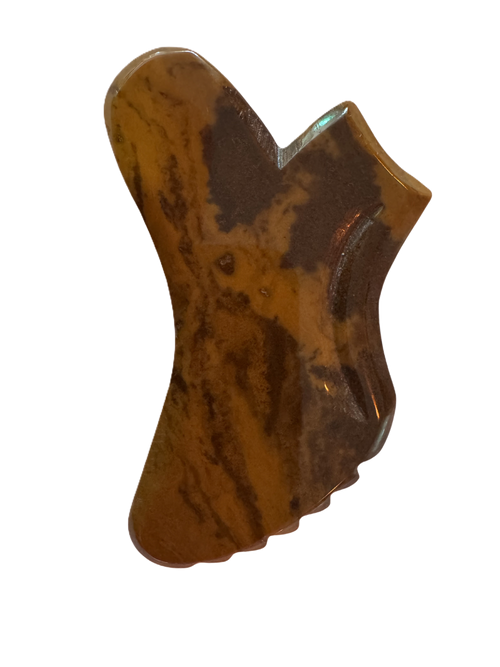 Brown stone with a unique shape on a white background